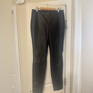 Size 4 vegan leather slim pants. Never worn. Vegan leather only in front